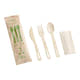A bamboo cutlery pack including a fork, knife, spoon, and napkin, packaged in a clear plastic pouch with green accents and text.