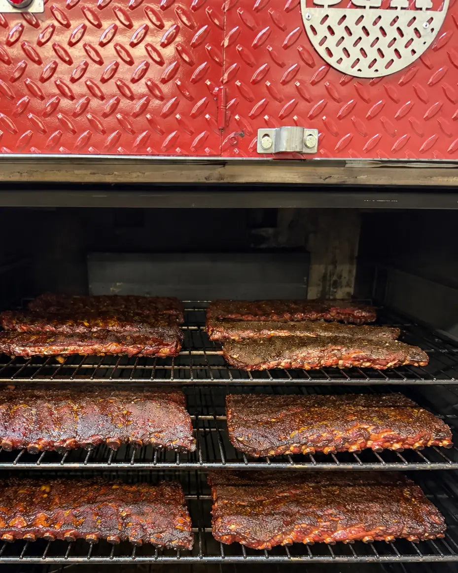 Pendragon’s Smokehouse smoker with smoked St. Louis pork ribs for catering order in Northern NJ