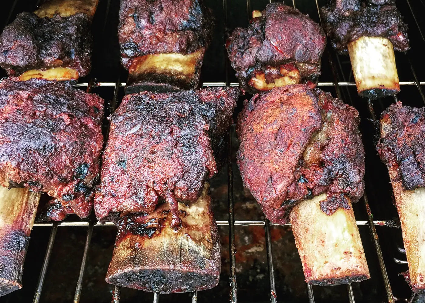 Smoked BBQ short ribs on a rack